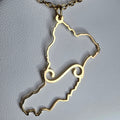 Golden pendant necklace with a simple swirl design in the shape of Canary Islands, Collar La Graciosa argolla canaria símbolo simple