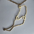Collar Fuerteventura argolla canaria símbolo simple gold-tone necklace with a minimalist map pendant on a chain