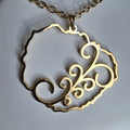 Collar La Gomera argolla canaria símbolo 8 espirales gold-tone pendant with elegant spiral design on chain