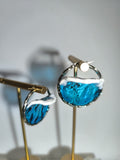 Argollas grandes con diseño de olas marinas