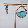 pendientes tipo argollas con olas artesanales doradas leche machanga creations